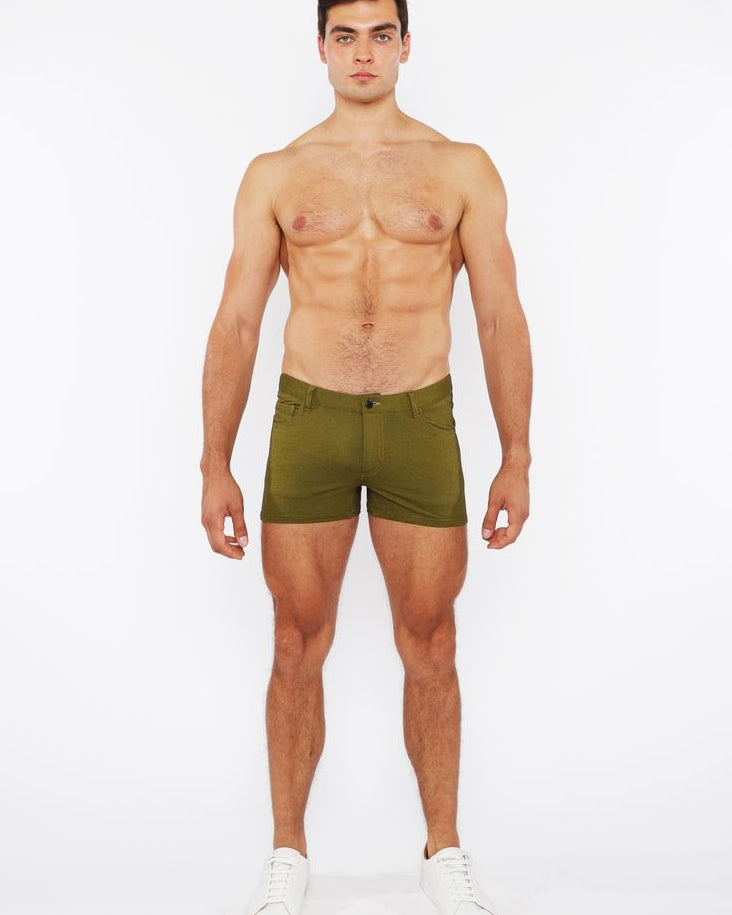 Man wearing green underwear on a white background
