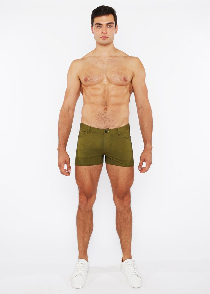 Man wearing green underwear on a white background