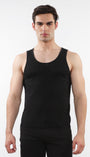 A male model wearing a black stretch knit tank top with a scoop neckline and sleeveless silhouette.