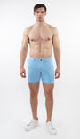 ST33LE mens pale blue stretch shorts worn by shirtless male model with white sneakers